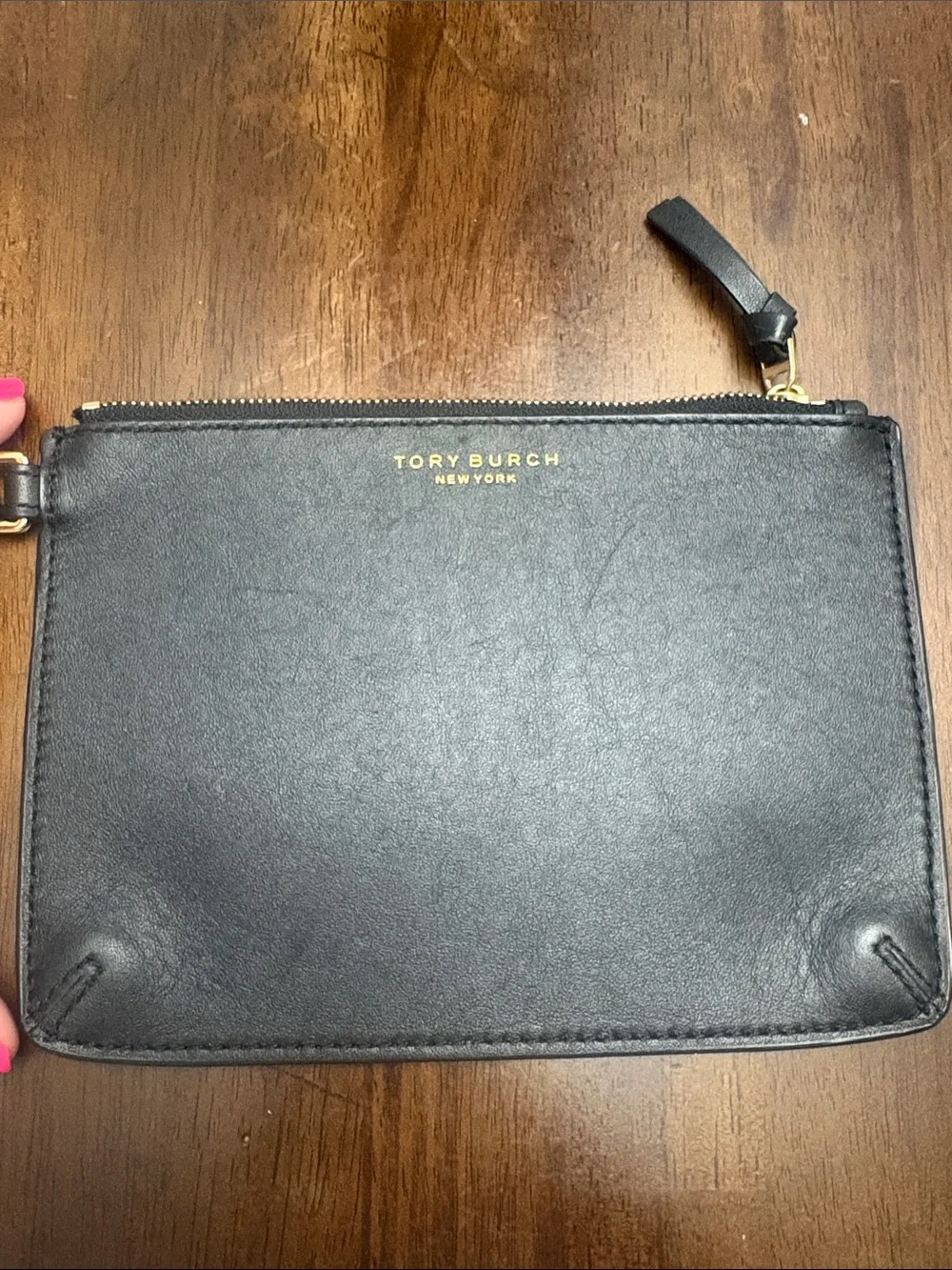 Tory Burch Black Leather Wristlet with Gold Logo. Like new no callouts